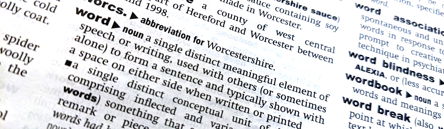 close up of the definition of word in a dictionary