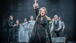 production shot showing tracy-ann oberman as shylock in the merchant of venice